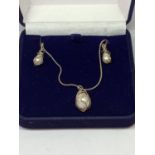 A BOXED SILVER AND PEARL NECKLACE AND EARRING SET