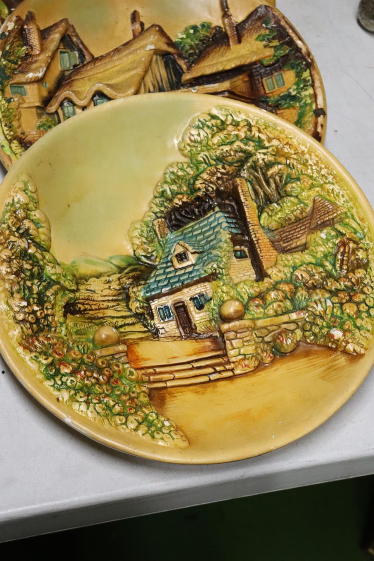 THREE VINTAGE 3-D CHALK PLATES WITH COTTAGE DESIGN, DIAMETER 31CM - Image 2 of 4