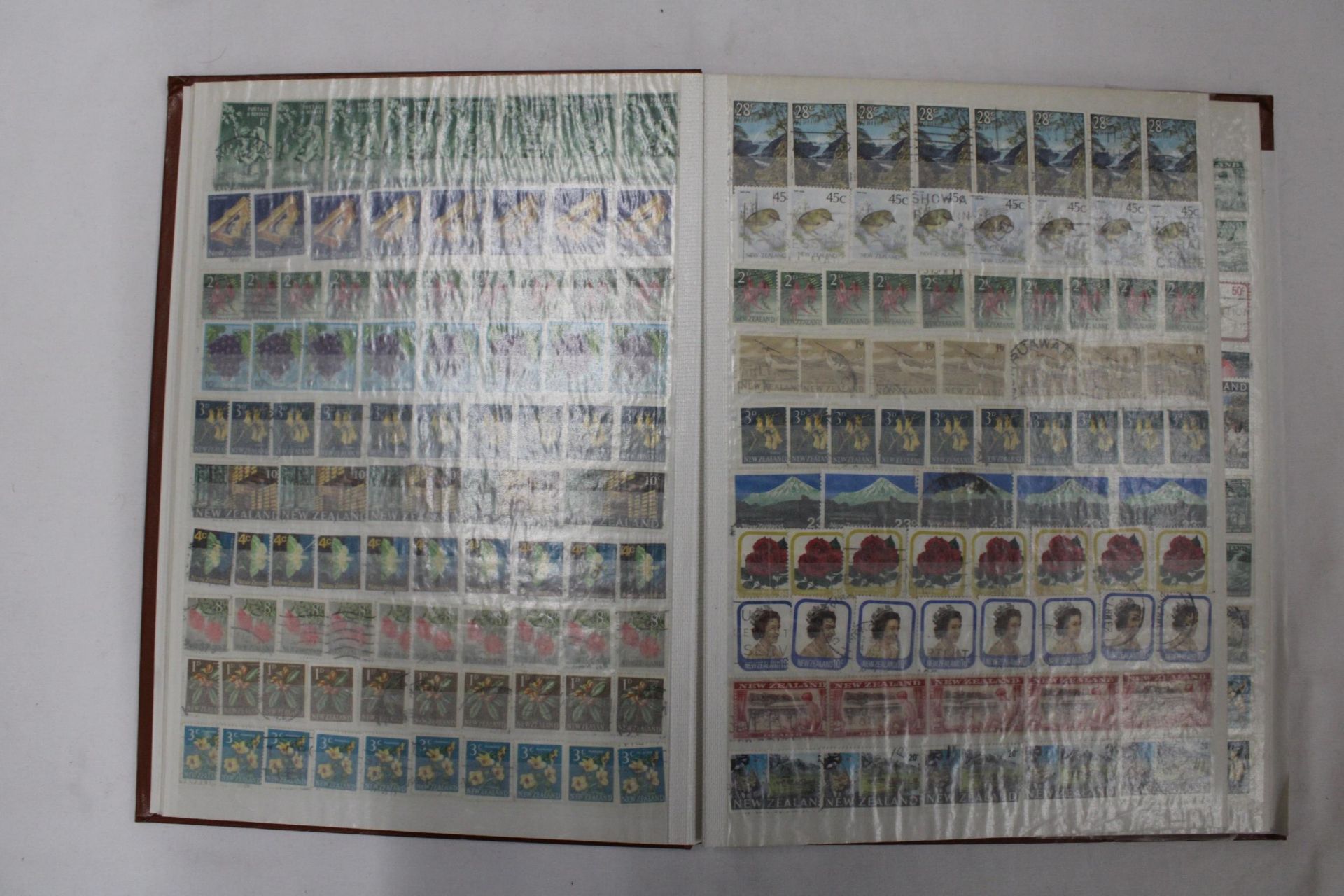 TWO FULL ALBUMS CONTAINING BRITISH AND FOREIGN STAMPS - Image 2 of 6