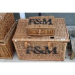 A FORTNUM AND MASON WICKER PICNIC HAMPER AND A SMALL WICKER FORTNUM AND MASON BASKET