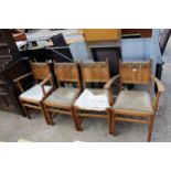 FOUR JAMES PHILLIPS AND SON OAK ARTS AND CRAFTS STYLE CHAIRS TWO BEING CARVERS