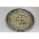 A FRENCH 'PECH-MERLE' PLATE WITH ANIMAL DESIGN, DIAMETER 29CM