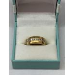 A SILVER GILT AND STONE RING IN A PRESENTATION BOX