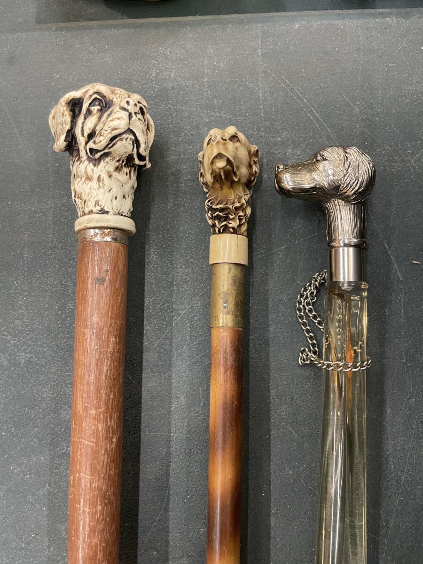 TWO CARVED DOG HEAD WALKING STICKS AND A WHITE METAL DOG HEAD SHOE HORN - Image 2 of 5