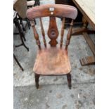 A VICTORIAN BEECH BULLSEYE BACK KITCHEN CHAIR