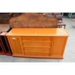 A MODERN G PLAN SIDEBOARD ENCLOSING FOUR DRAWERS AND TWO CUPBOARDS, 61" WIDE