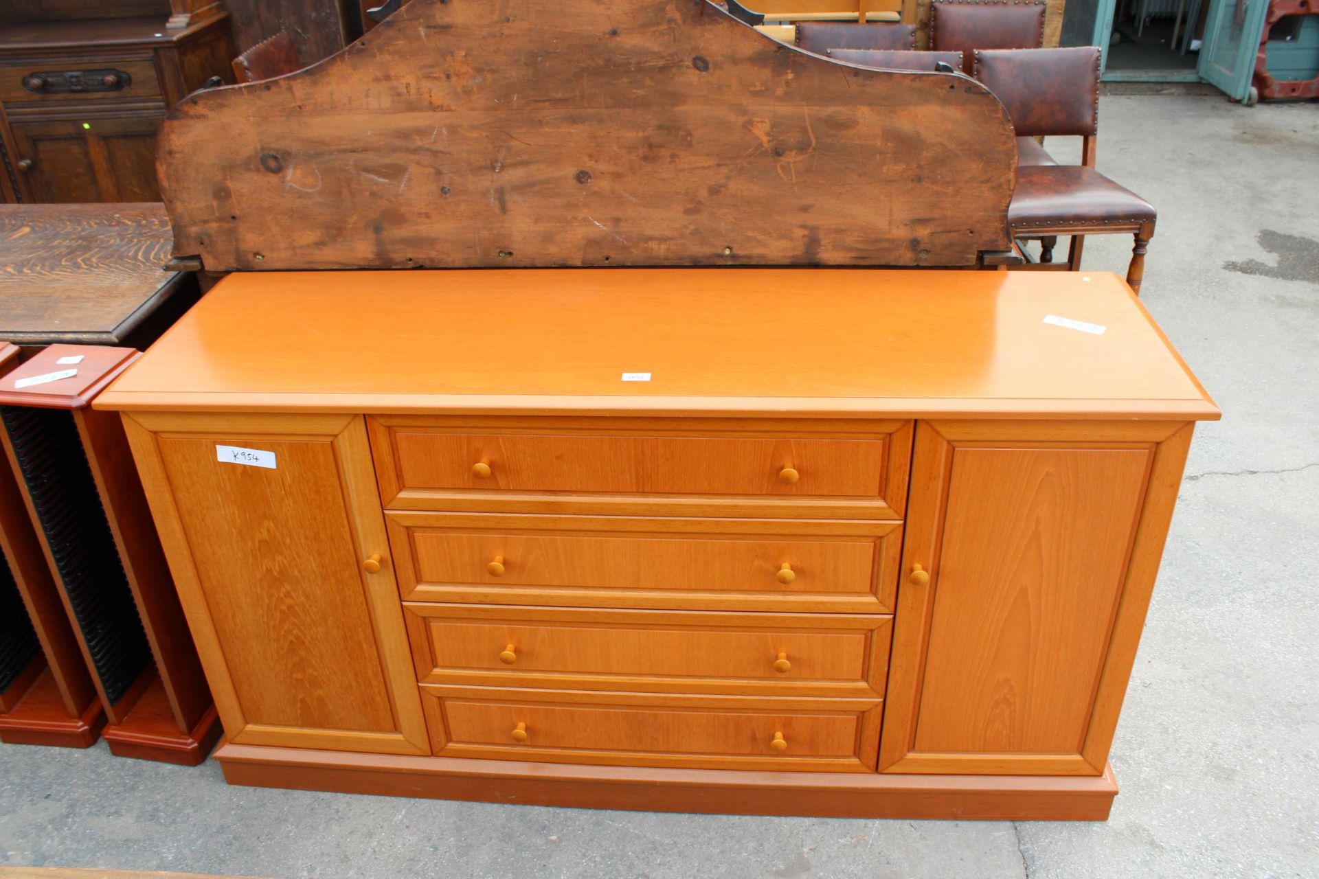 A MODERN G PLAN SIDEBOARD ENCLOSING FOUR DRAWERS AND TWO CUPBOARDS, 61" WIDE