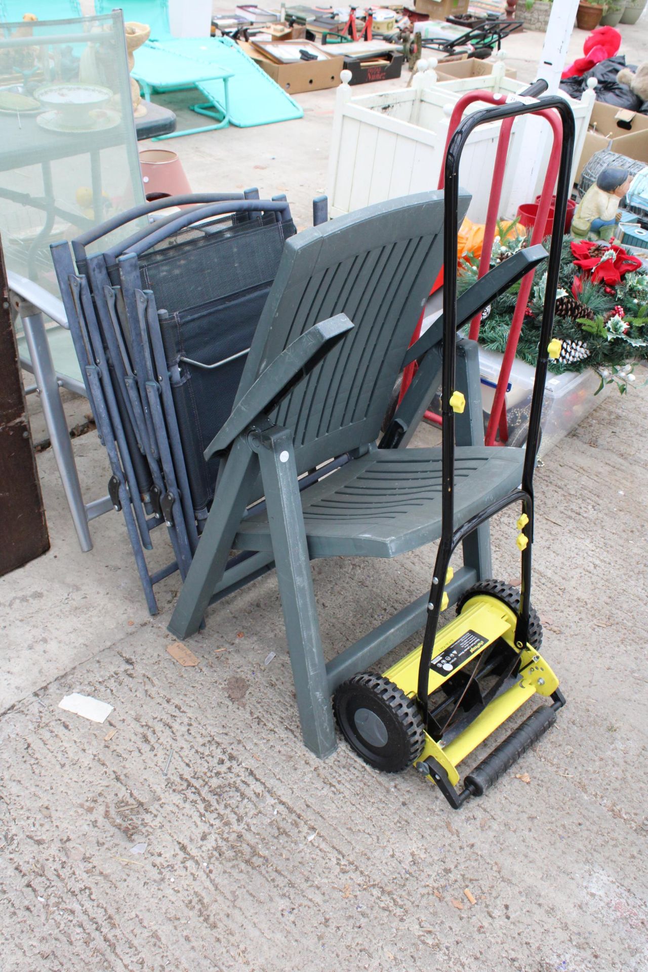 A COLLECTION OF VARIOUS GARDEN CHAIRS AND A CHALLENGE PUSH MOWER