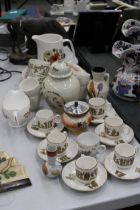 A QUANTITY OF CERAMICS TO INCLUDE CLASSICAL THEMED CUPS AND SAUCERS, PLATES, A LIDDED JAR,