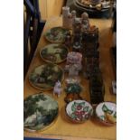 A MIXED LOT TO INCLUDE FIGURES, CERAMIC HOUSES, WALL PLAQUES, GLASS SHELLS, ETC.,
