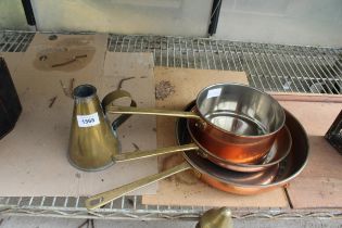 THREE GRADUATED COPPER FRYING PANS WITH BRASS HANDLES AND A BRASS VESSEL