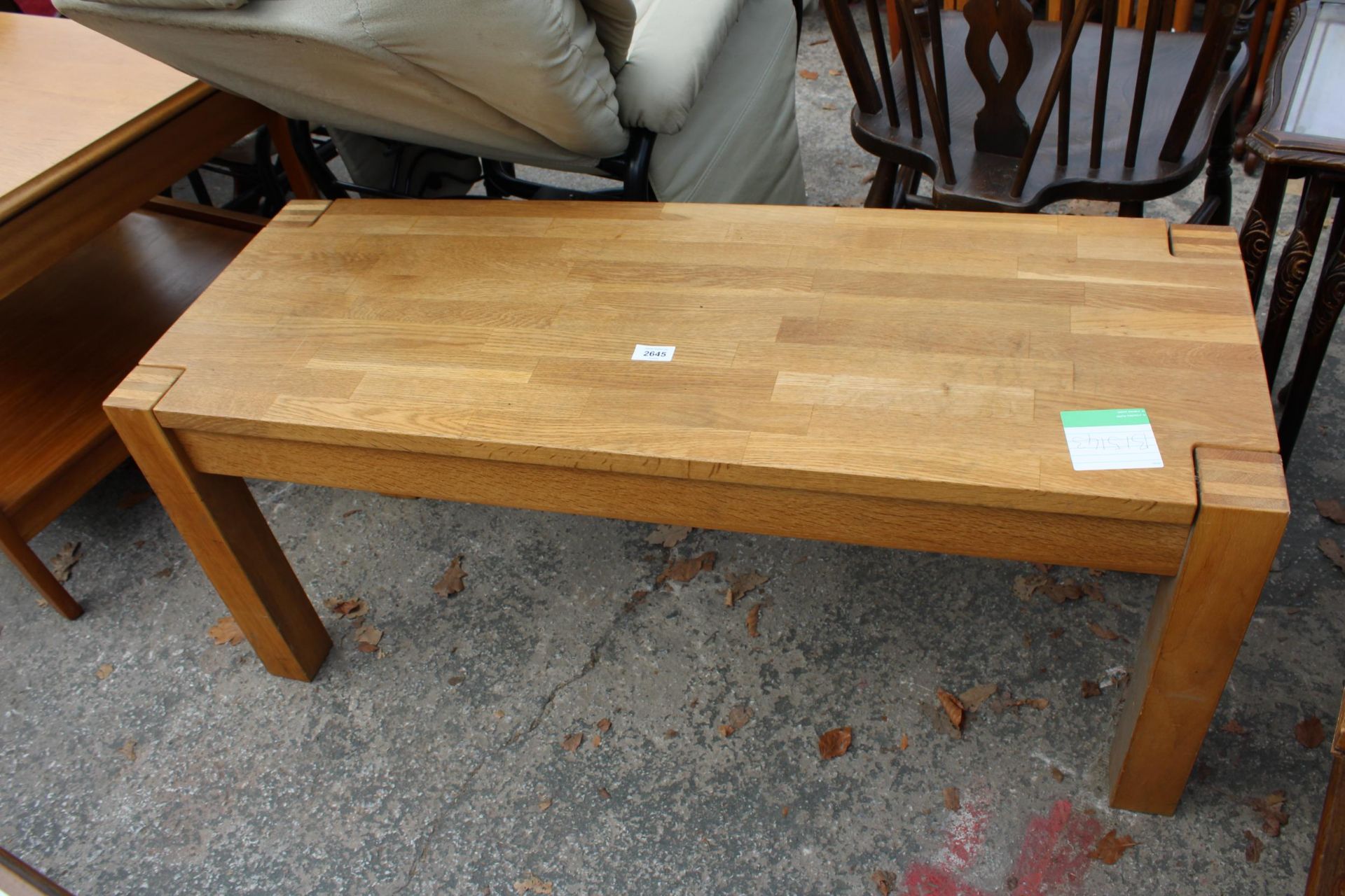 A MODERN OAK COFFEE TABLE WITH WOODBLOCK TOP, 43" X 16"