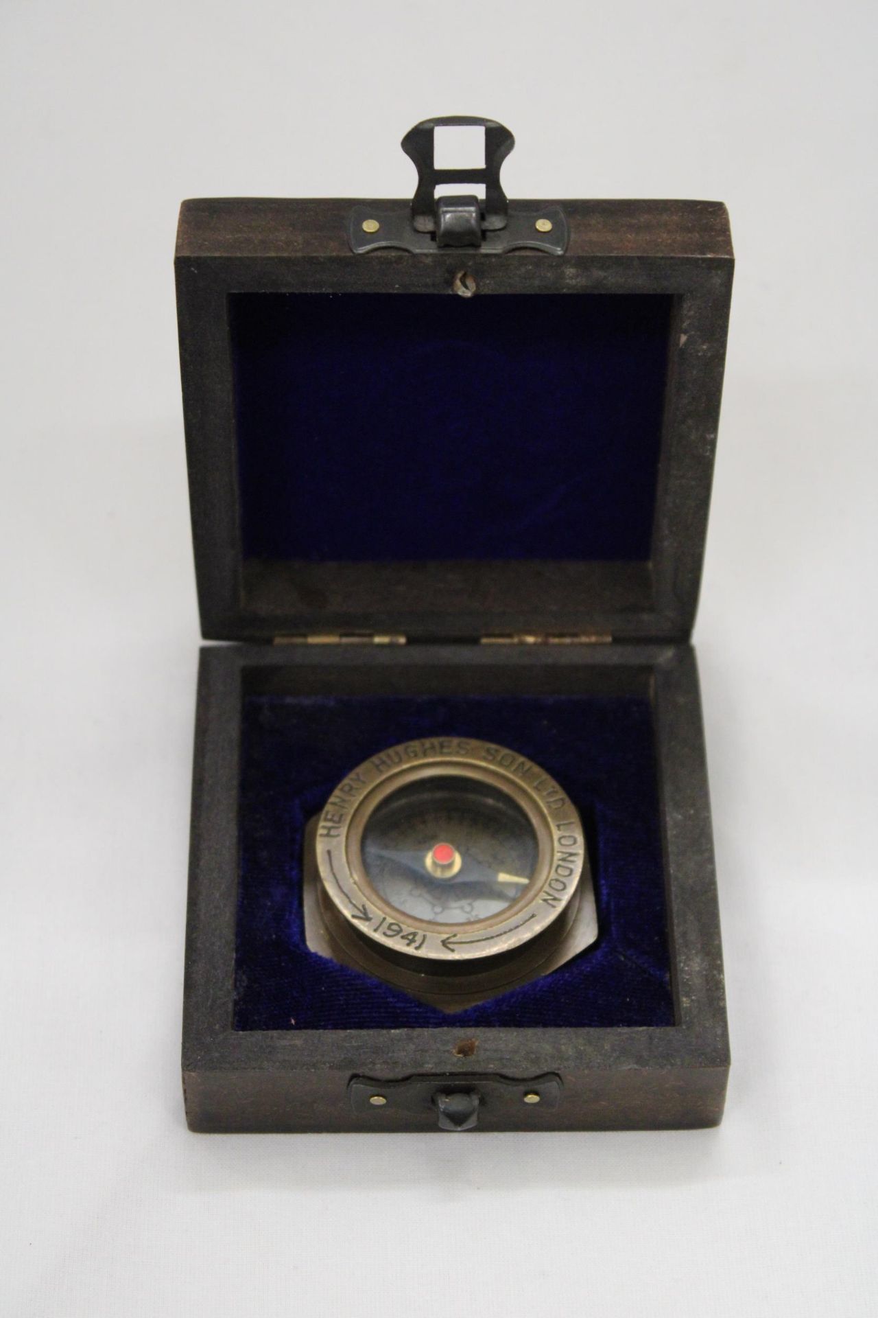 A BOXED BRASS SUNDIAL COMPASS