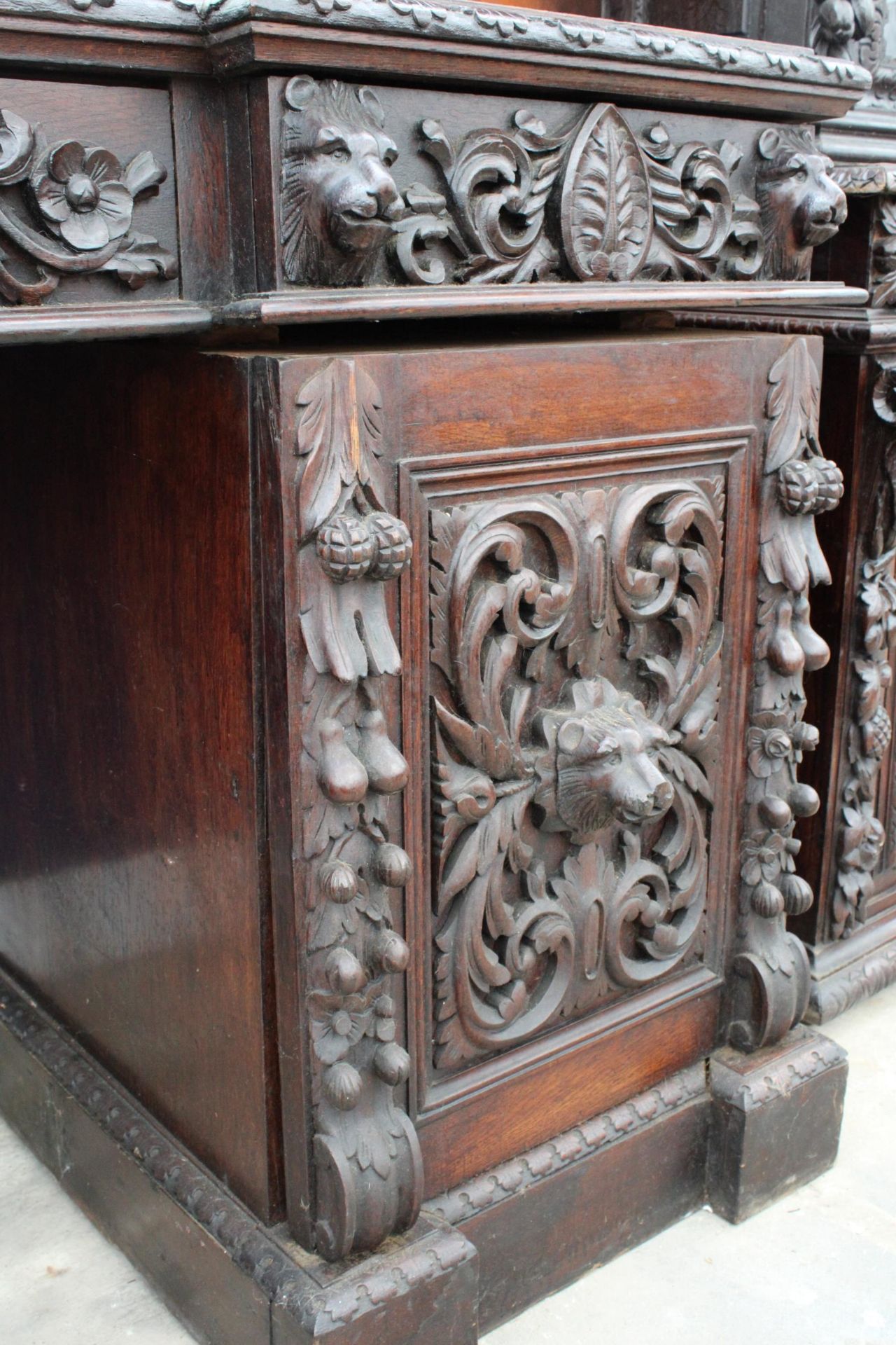 A VICTORIAN OAK BLACK FOREST STYLE MIRROR BACK SIDEBOARD HEAVILY CARVED WITH LION MASK HEAD AND - Image 2 of 7