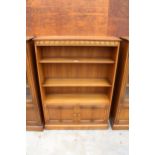 AN ERCOL BLONDE THREE TIER OPEN BOOKCASE WITH CUPBOARD TO BASE 39.5" WIDE