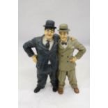 A LARGE FIGURE GROUP OF LAUREL AND HARDY, HEIGHT 37CM