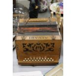 A VINTAGE ALVARI BUTTON ACCORDIAN