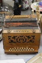 A VINTAGE ALVARI BUTTON ACCORDIAN