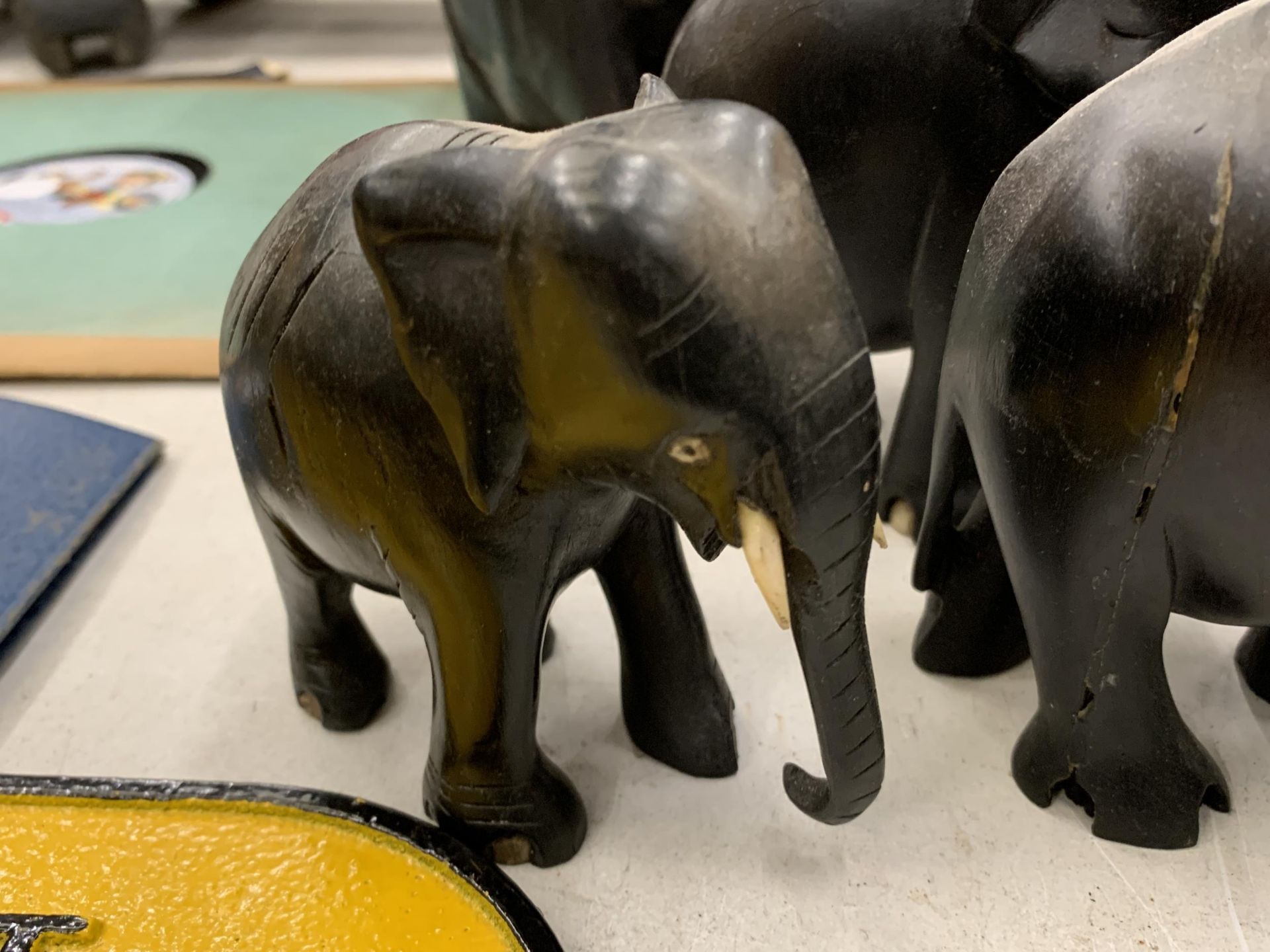 A COLLECTION OF SEVEN WOODEN ASIAN ELEPHANTS - Image 2 of 4