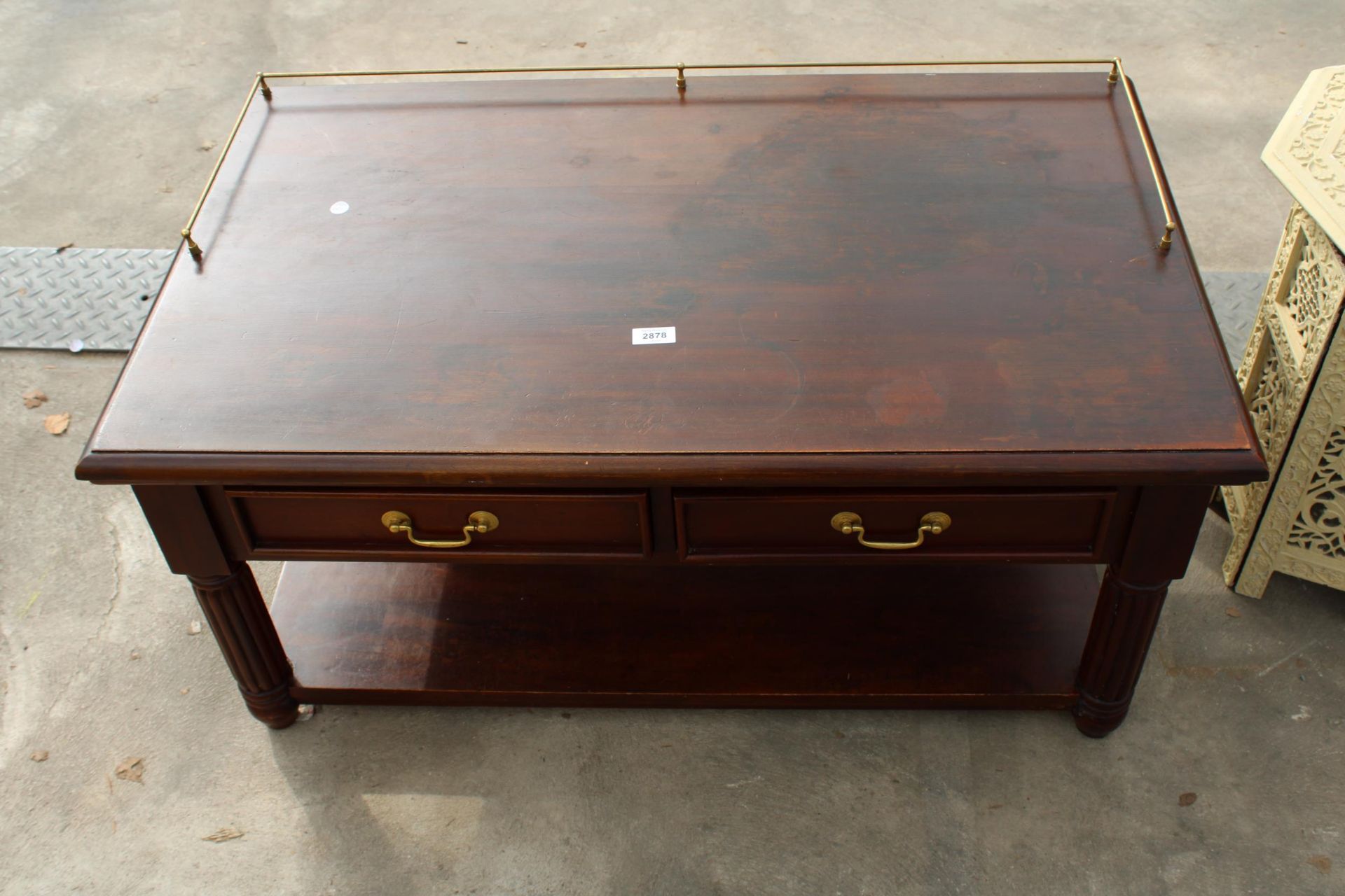 A MODERN HARDWOOD LOW SIDE TABLE WITH TWO DRAWERS AND BRASS GALLERY, 39" WIDE