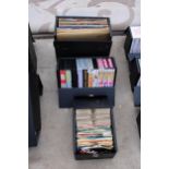 AN ASSORTMENT OF VHS VIDEOS, 7" SINGLES AND LP RECORDS