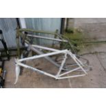 FOUR VARIOUS BIKE FRAMES TO INCLUDE A GALLERUS AND A TREK ETC