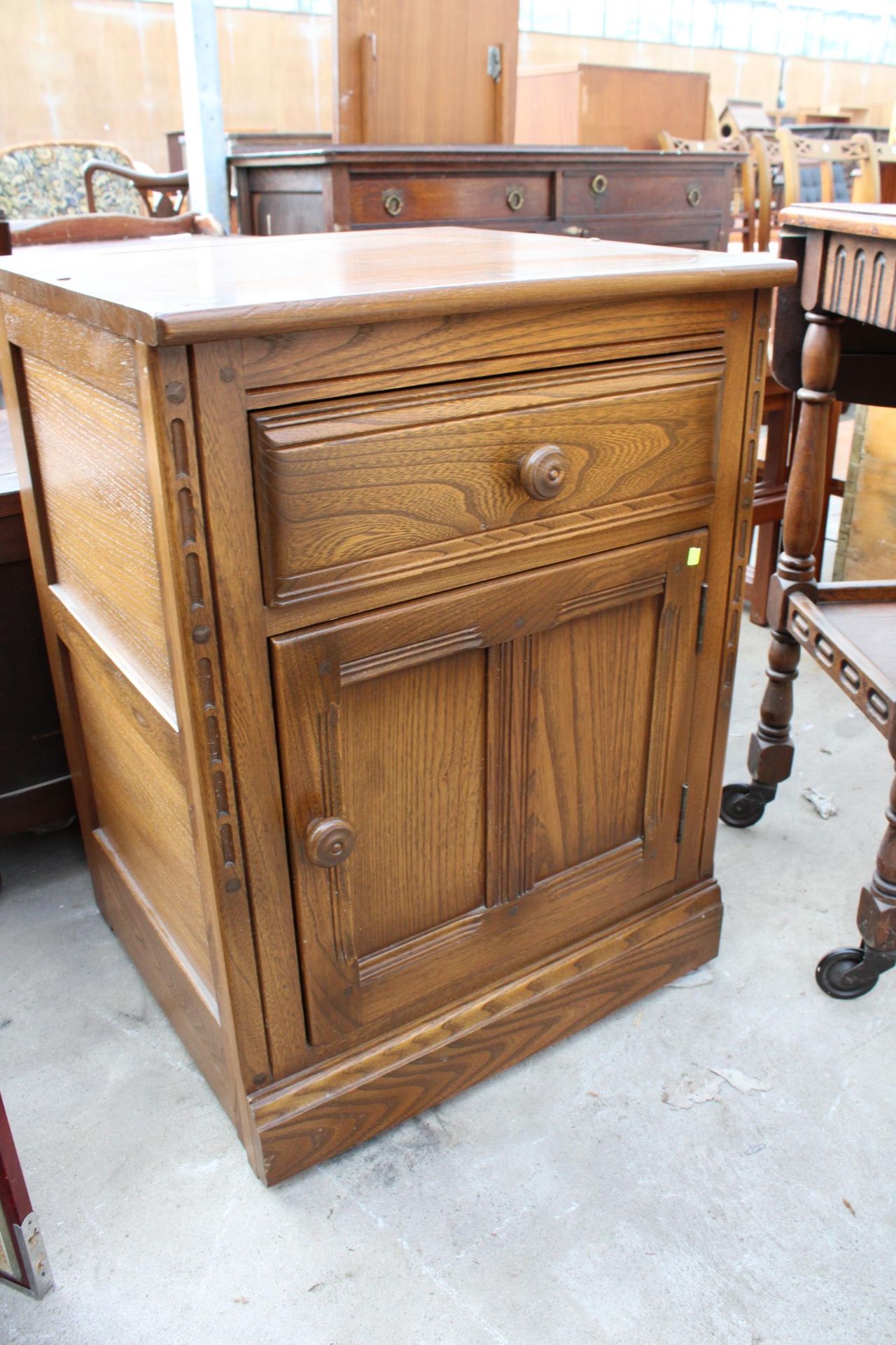 AN ERCOL BLONDE ELM BESIDE CABINET AND OAK TIER DROP-LEAF TROLLEY - Image 3 of 4