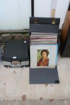 A PORTABLE RECORD PLAYER AND AN ASSORTMENT OF LP RECORDS