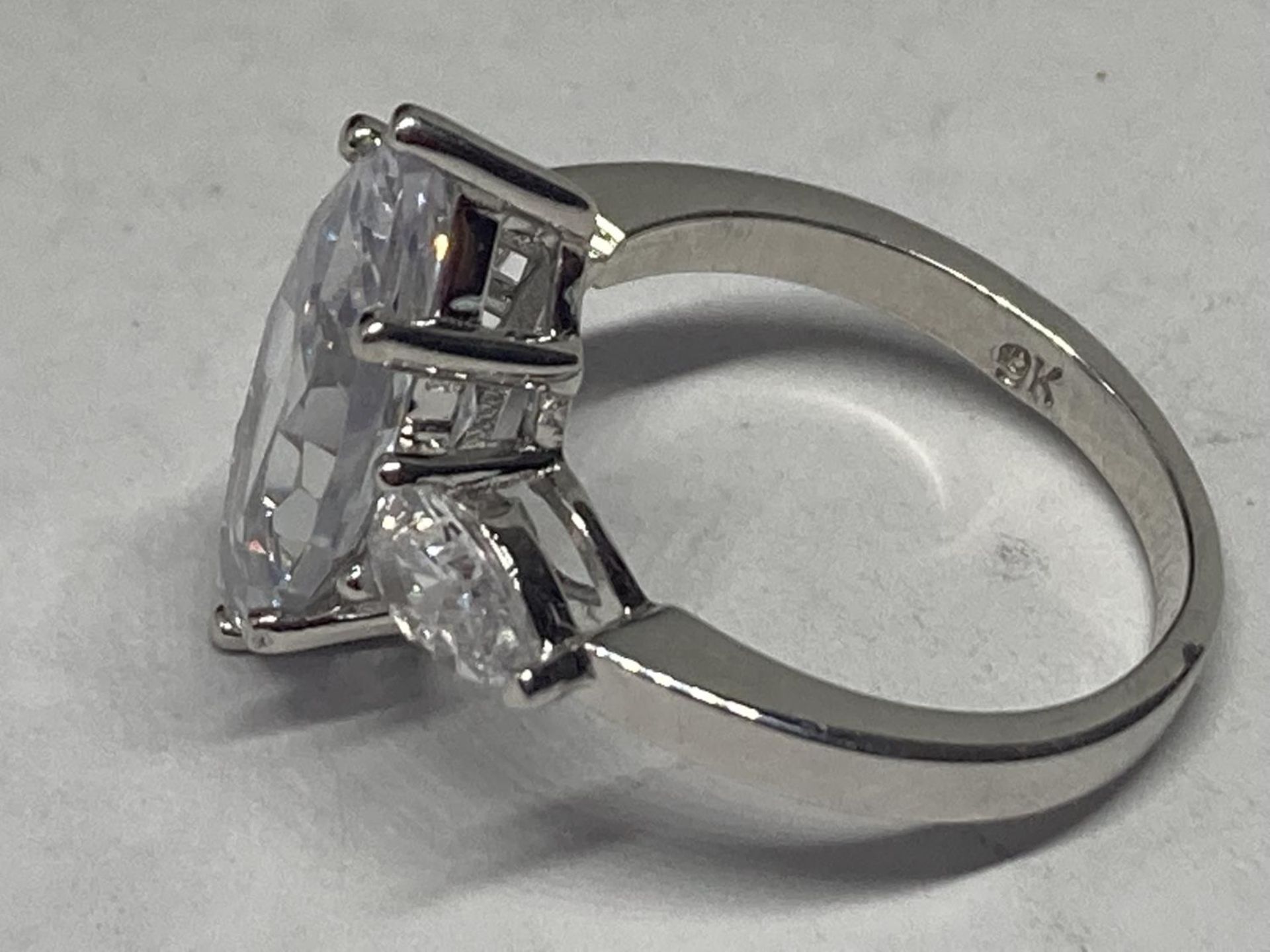 A MARKED 9K RING WITH 5 CARATS OF MOISSANITE SIZE L/M GROSS WEIGHT 4.85 GRAMS - Image 2 of 3