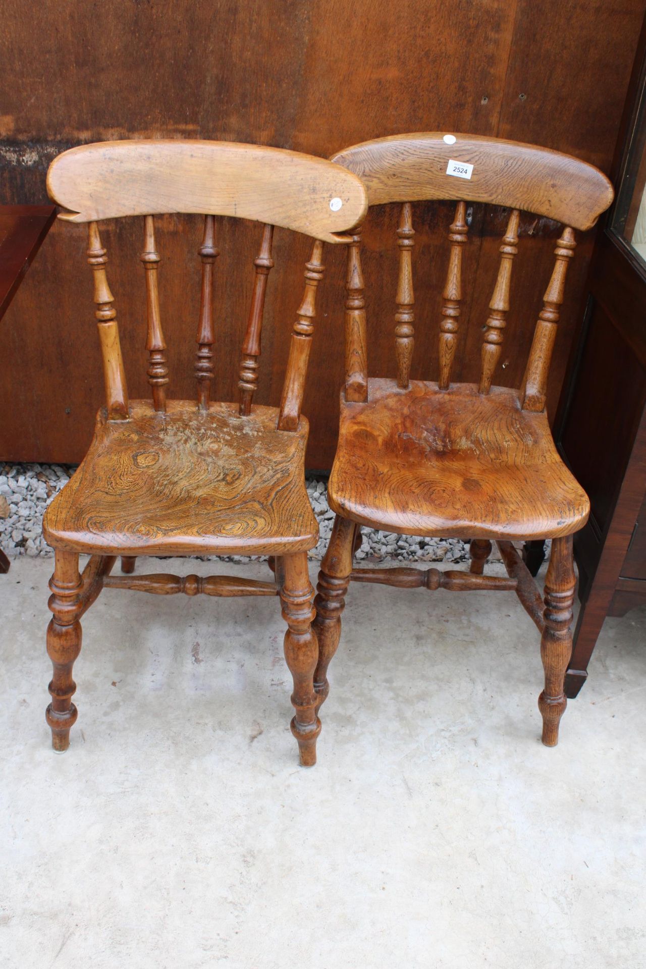 TWO VICTORIAN ELM KITCHEN CHAIRS WITH TURNED LEGS AND UPRIGHTS