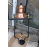 A LARGE VINTAGE COPPER AND CAST IRON GAS POWERED LAMP POST LIGHT FITTING