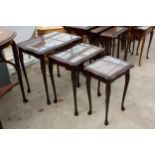 A MAHOGANY NEST OF THREE TABLES ON CABRIOLE LEGS