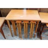 A RETRO TEAK NEST OF FIVE TABLES IN PAUL HUNDEVAD STYLE, FOUR BEING DROP-LEAF 15" DIAMETER