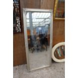 A MODERN SILVER GILT FRAMED WALL MIRROR, 63" X 28"