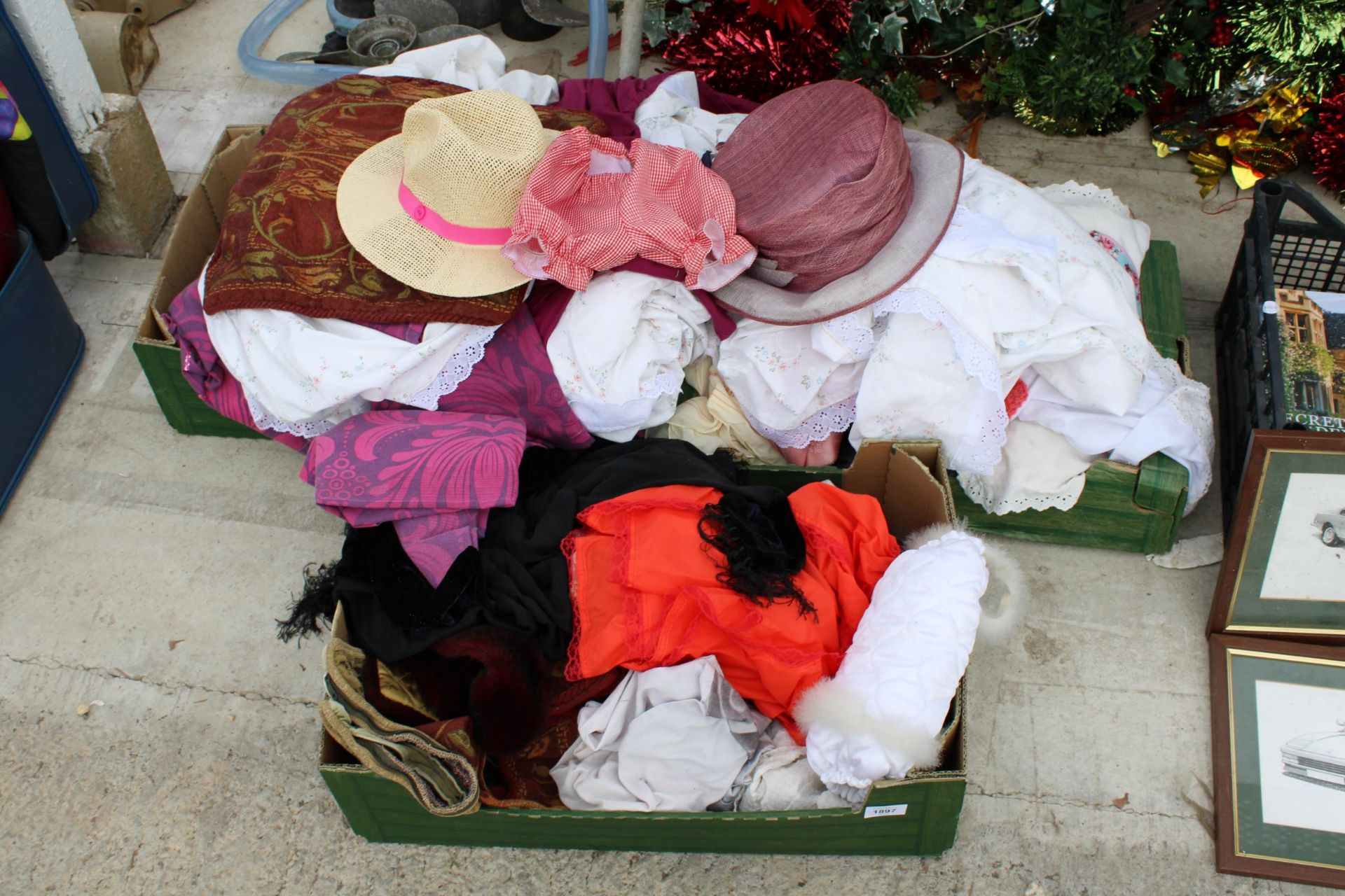 AN ASSORTMENT OF LADIES HATS AND CLOTHING