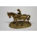 A DETAILED HEAVY BRASS HORSE AND JOCKEY FIGURE, HEIGHT 16CM, LENGTH 17CM