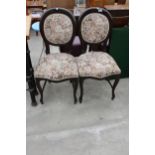 A PAIR OF VICTORIAN STYLE DINING CHAIRS