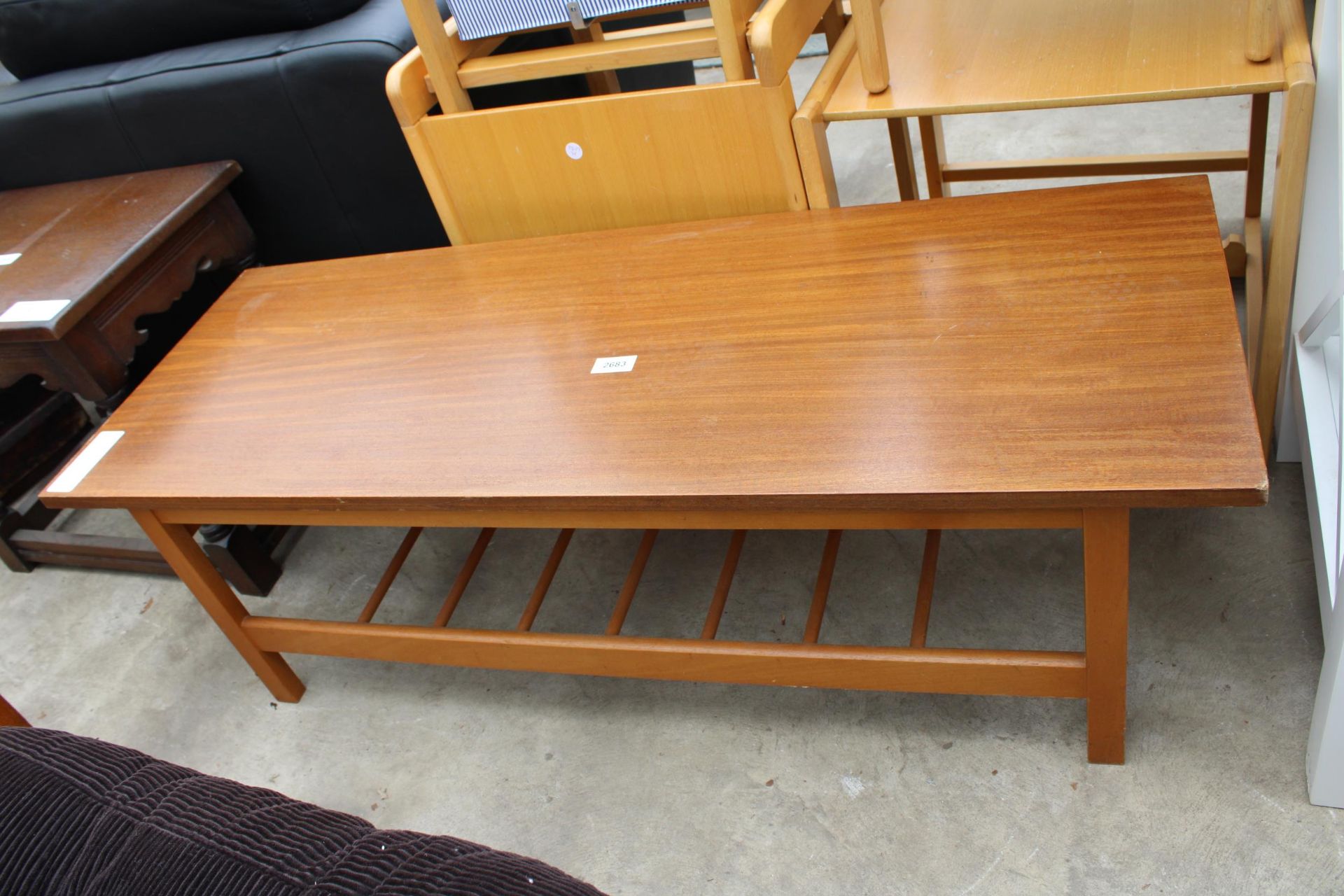 A RETRO TEAK TWO TIER COFFEE TABLE, 43" X 16"