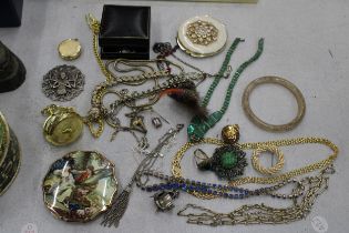 A QUANTITY OF COSTUME JEWELLERY TO INCLUDE CHAINS AND PENDANTS, RINGS, MODERN POCKET WATCHES,