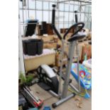 A DYNAMIX CROSS TRAINER EXERCISE MACHINE