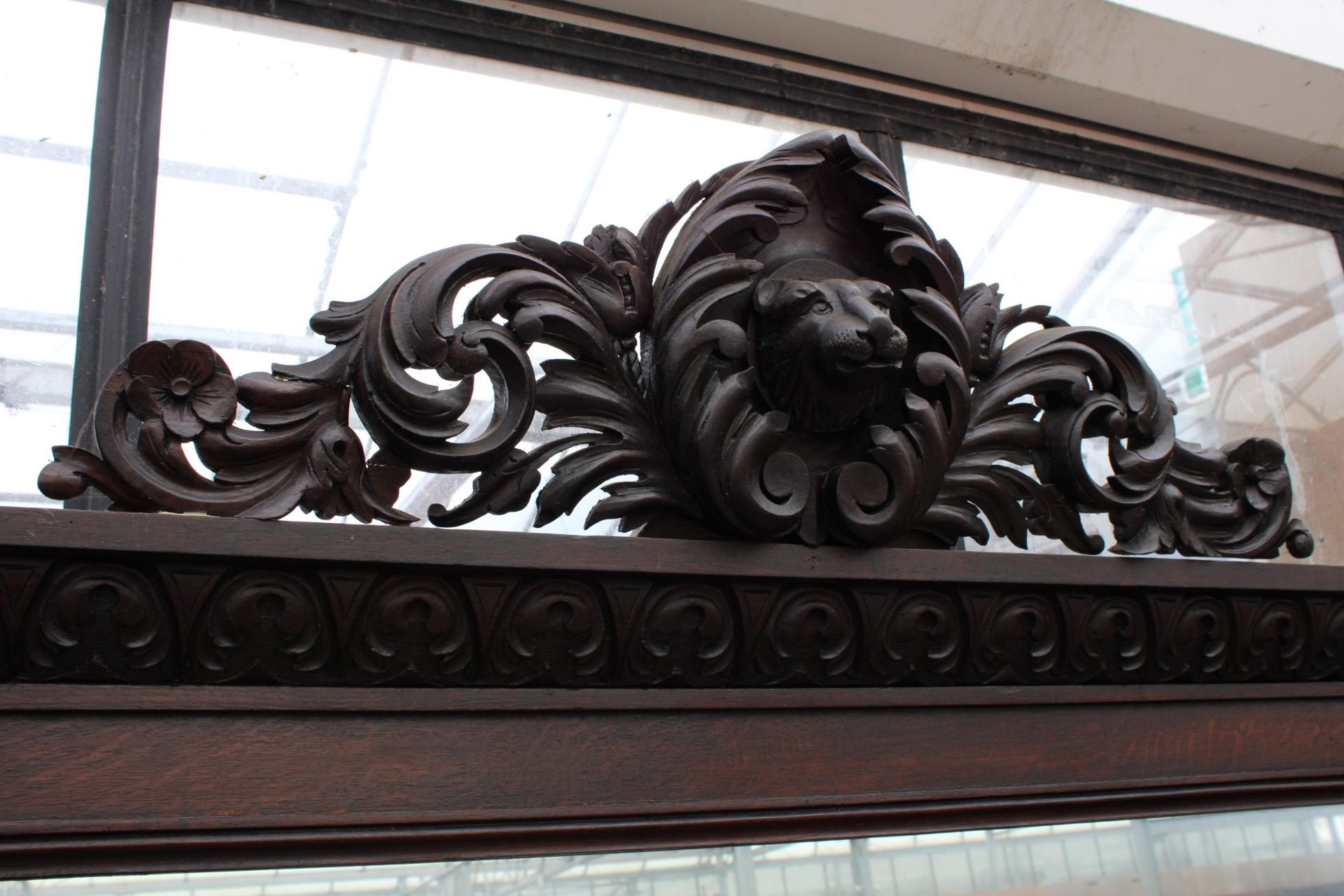 A VICTORIAN OAK BLACK FOREST STYLE MIRROR BACK SIDEBOARD HEAVILY CARVED WITH LION MASK HEAD AND - Image 4 of 7