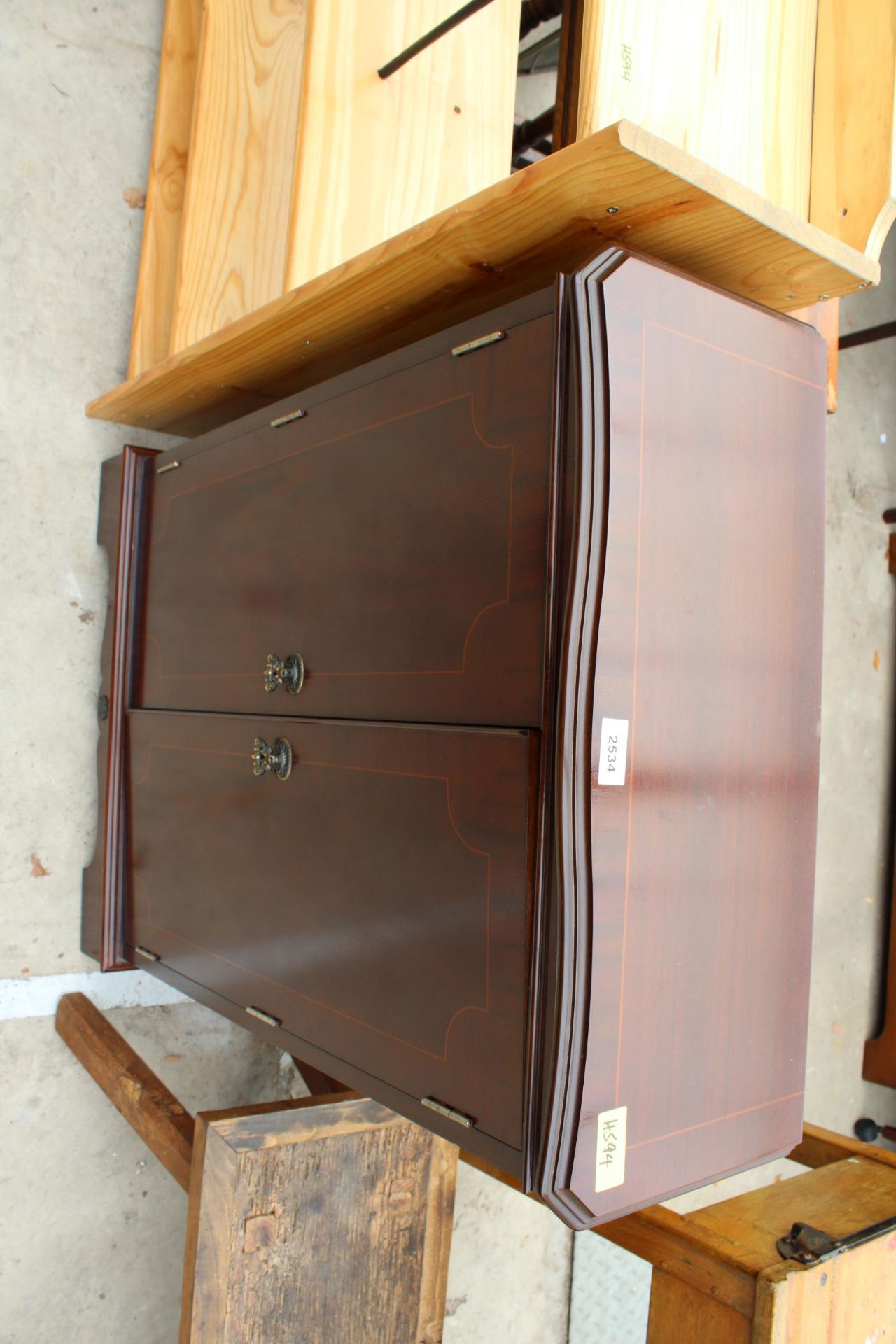 A MAHOGANY AND CROSSBANDED TWO DOOR CABINET AND SET OF OPEN PINE SHELVES - Image 2 of 3