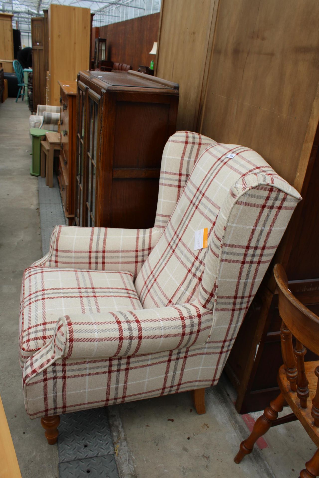 A CHECK PRINT H.S.L. PETITE WINGED FIRESIDE CHAIR ON TURNED FRONT LEGS - Image 2 of 2