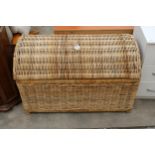 A MODERN WICKER DOMED TOP BLANKET CHEST