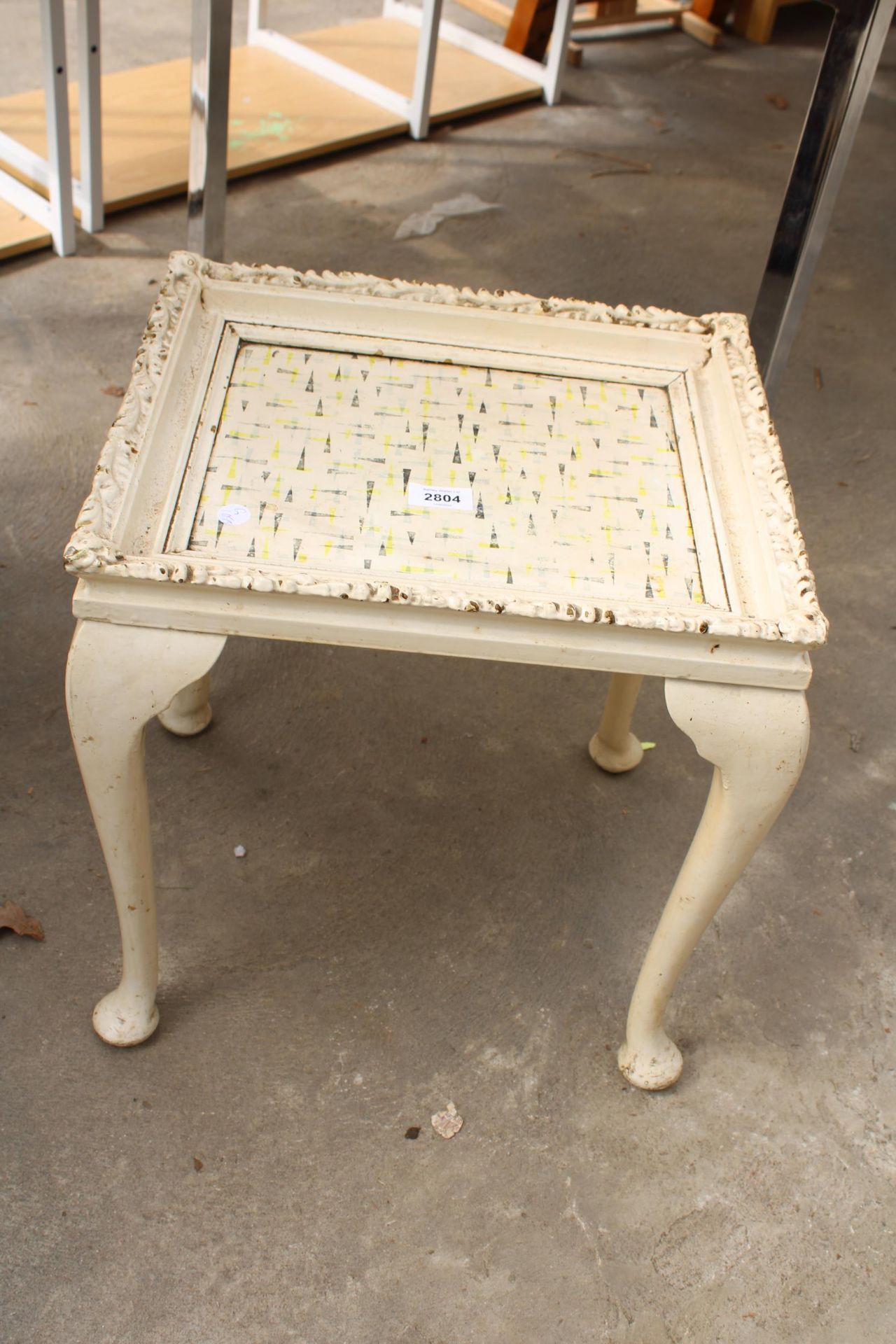 A MODERN PICTURE FRAME TABLE ON CABRIOLE LEGS, 16" X 14"