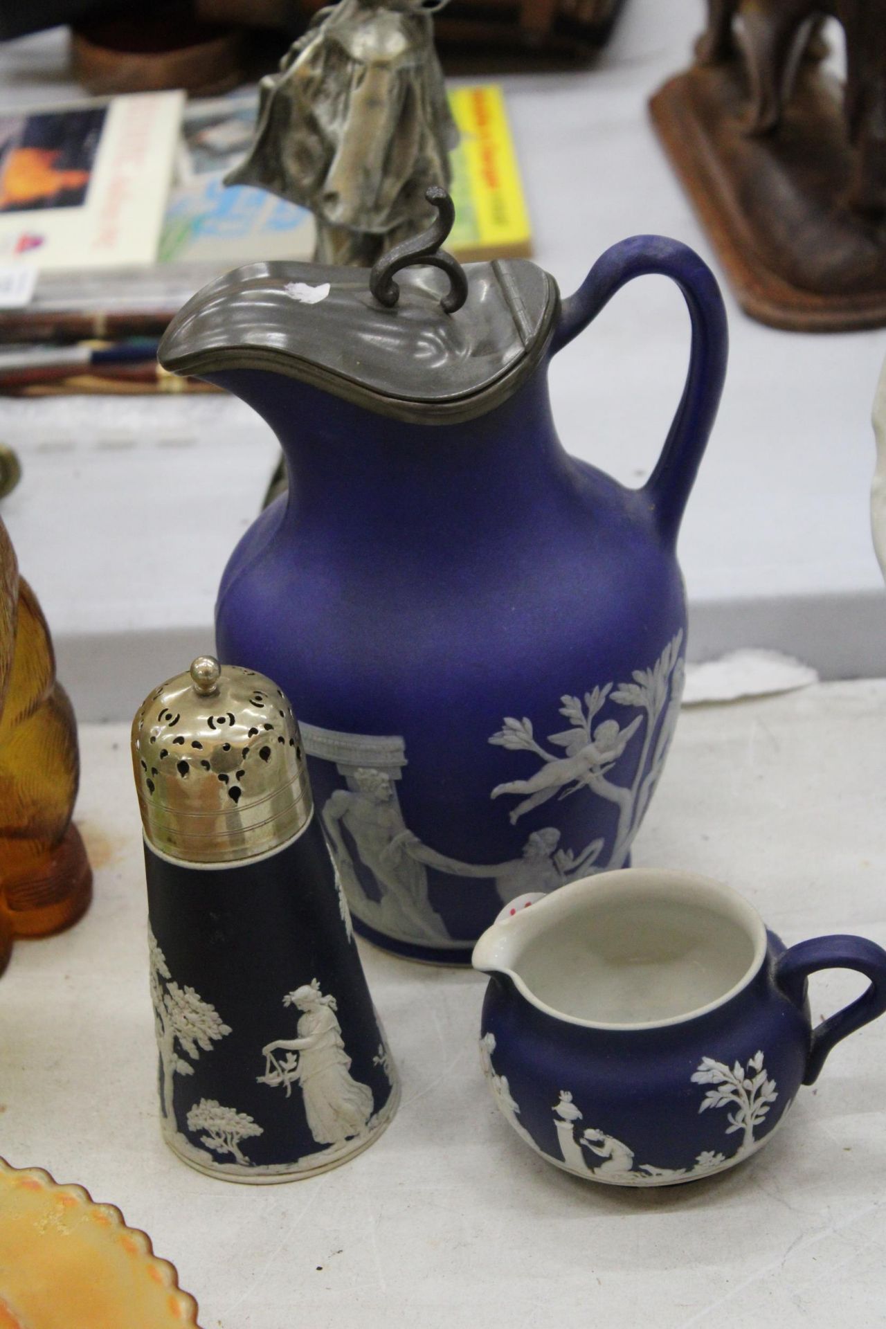 THREE PIECES OF JASPERWARE TO INCLUDE A WEDGWOOD JUG WITH PEWTER LID - A/F TO BASE, AN ADAMS SMALL