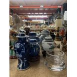 A MIXED LOT OF ORIENTAL STYLE GINGER JARS SOME ON WOODEN STANDS TO INCLUDE A GLASS POT AND A