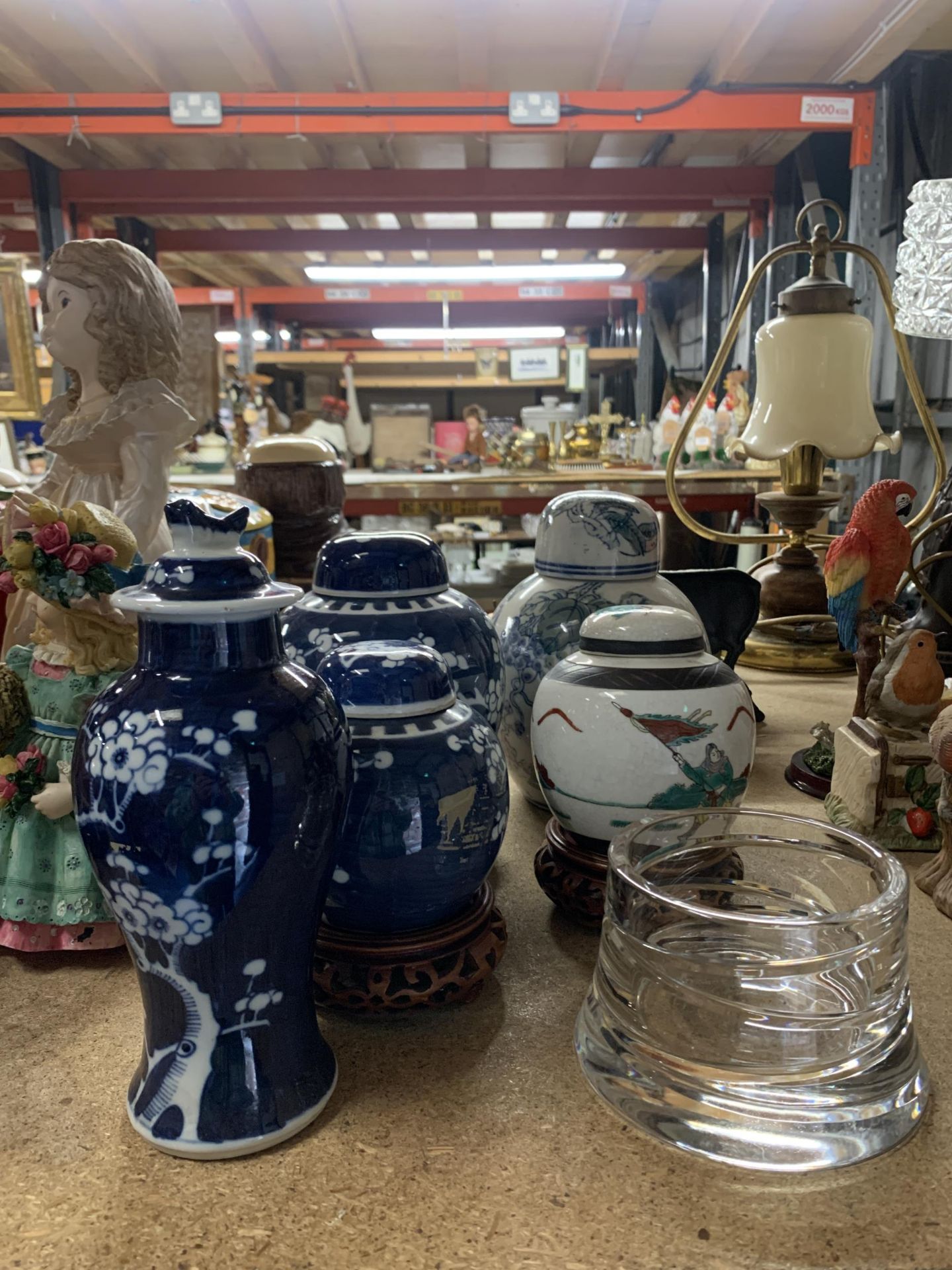 A MIXED LOT OF ORIENTAL STYLE GINGER JARS SOME ON WOODEN STANDS TO INCLUDE A GLASS POT AND A