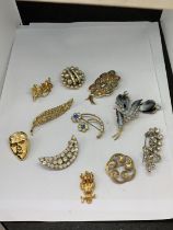 A COLLECTION OF VARIOUS BROOCHES