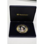 A BOXED 2013 CORONATION JUBILEE 65MM COIN WITH CERTIFICATE OF AUTHENTICITY